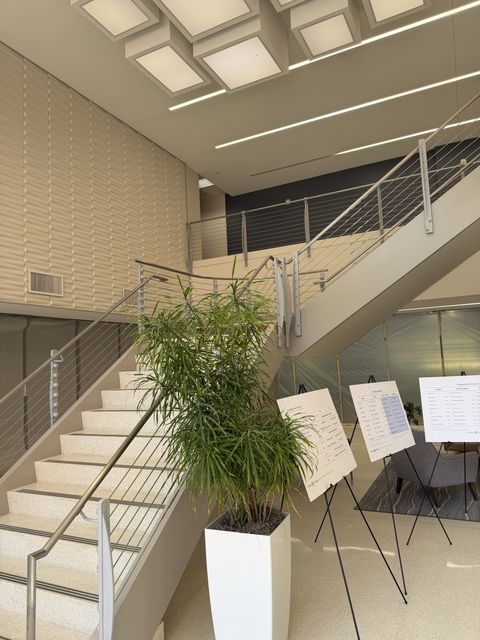 Two-story lobby with feature stair