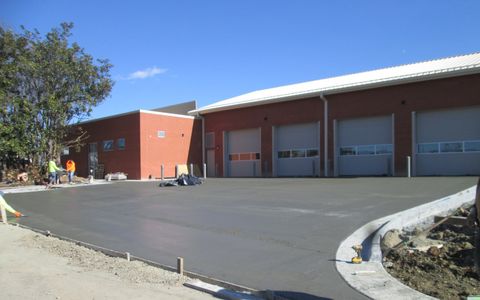 Durham County EMS Station 1 exterior with apparatus bay doors