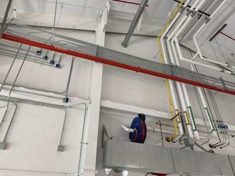 Coordinated MEP systems above the apparatus bay