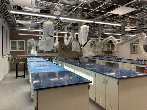 Renovated forensic laboratory with lab benches and exhaust snorkels